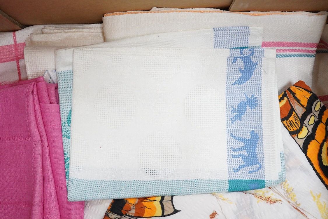 A collection of late 20th century damask cloth napkins woven in bold pinks and blues, together with later butterfly seersucker printed panels